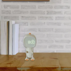 Oswietlenie-do-pokoju-dzieciecego - budzik dla dzieci na biurko robot dino biały zabawka dla przedszkolaka interblue 